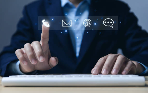 istock Businessman hand touching icon for phone, email, address, live chat on virtual screen. concept of contact us for customer service center connection 1472228606