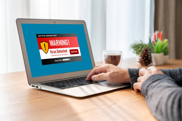 istock Virus warning alert on computer screen detected modish cyber threat 1472228752