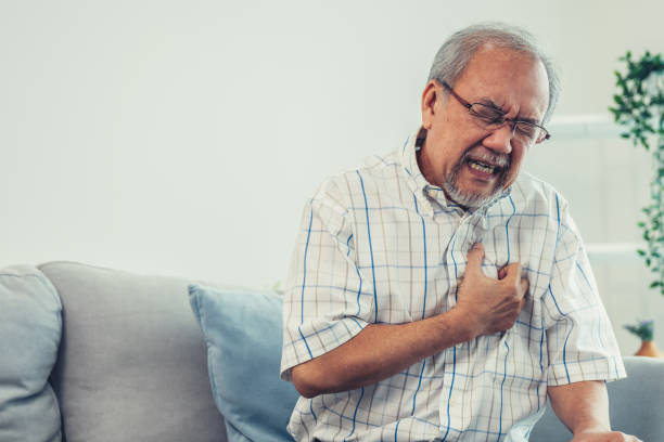 istock An agonizing senior man suffering from chest pain or heart attack. 1472235148