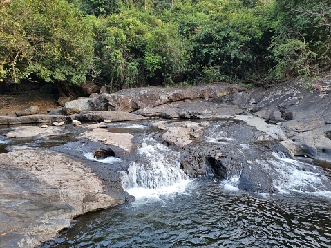 View of the Kozhippara waterfalls in Kakkadampoyil, Calicut, India.