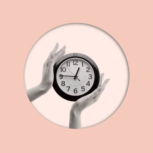 istock Contemporary collage of hands holding clock. 1472238083
