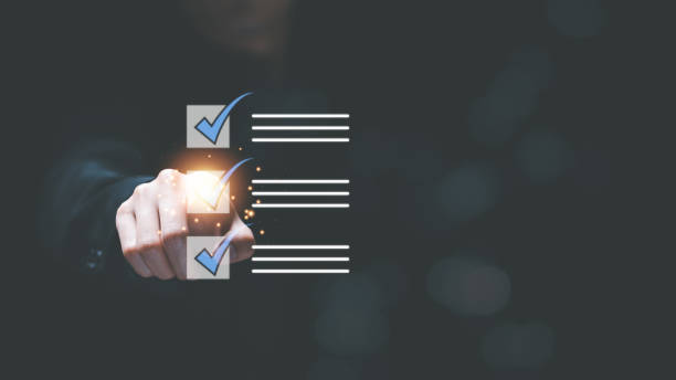 istock man check mark about exploring topics,In the virtual form check sheet,checklist ideas, checkbox to conduct opinion and quality surveys or satisfaction,Connect and work with modern wireless technology 1472239131