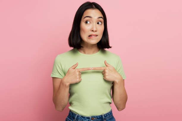 istock Thoughtful girl pondering serious issues, looking with uncertain hesitant expression 1472243055