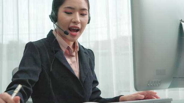 istock Enthusiastic female operator provide helpful customer service to customer. 1472250861