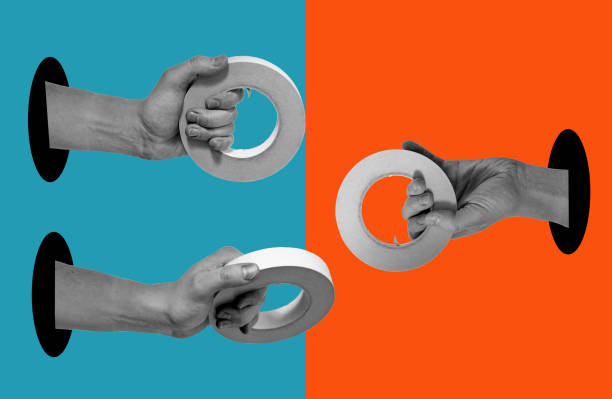 istock Art collage of hands with scotch tape on a surreal background. 1472253201