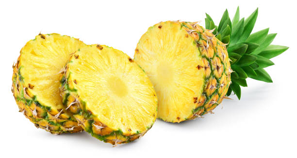 istock Pineapples isolated. Pineapple half with leaves on white background. Cut pineapple with round slices. Composition isolate on white. 1472254698