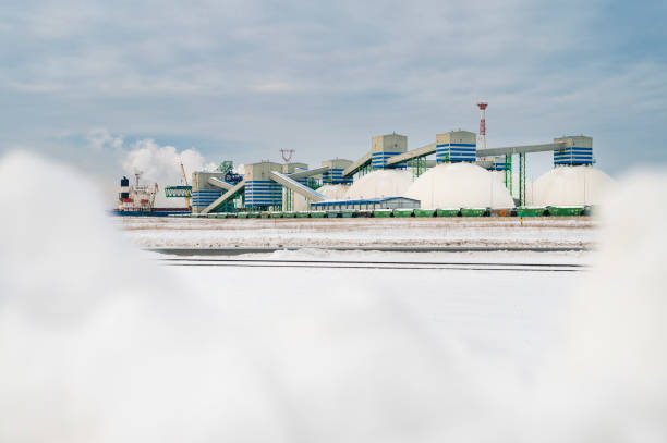 istock Industrial harbour during snowy winter, buildings in foreground 1472255096