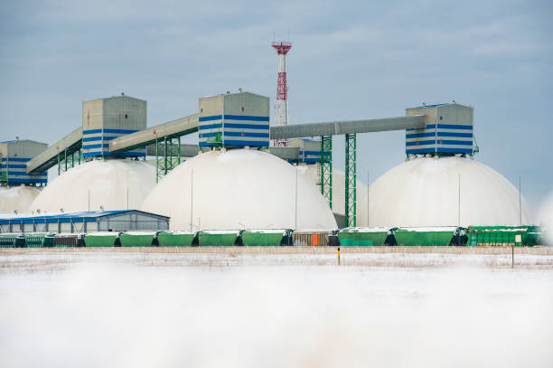 istock Industrial harbour during snowy winter, buildings in foreground 1472255218