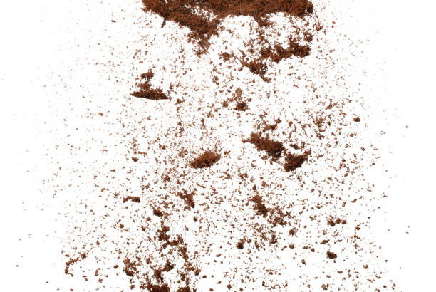 istock Coconut peel husk flying explosion, coconut chopped fine small S size fall down as dust. Coconut powder peel fertilizer splash throwing in Air. White background Isolated high speed shutter, freeze 1472255510
