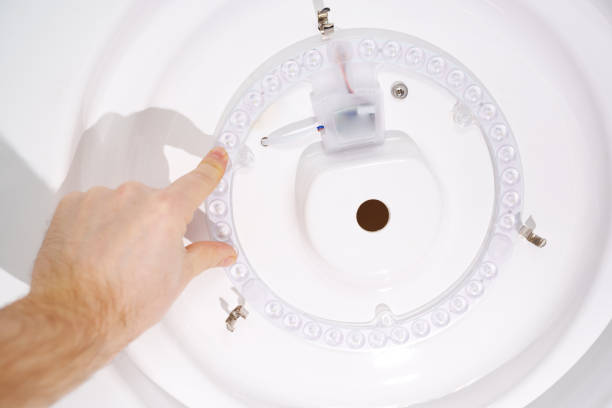 istock installation of ring LED module. concept of modern lighting. 1472256282