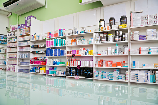 Shelves with medicaments in pharmacy