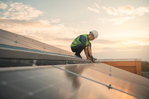 istock Service engineer checking solar cell on the roof for maintenance if there is a damaged part. Engineer worker install solar panel. Clean energy concept. 1472256550