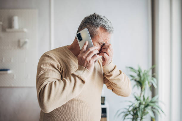 Failure, worried businessman talking using mobile phone