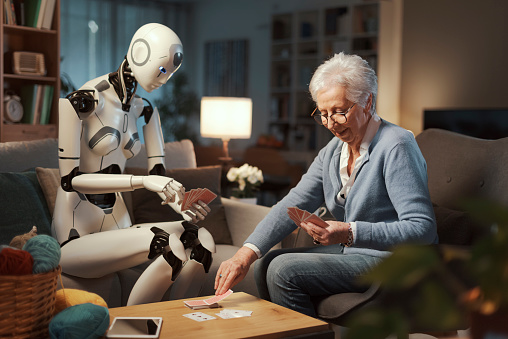 An elderly lady spends an amusing afternoon cioing cards with her domestic android with A.I. She is' sure he will not cheat.