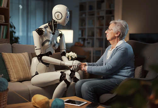 An elderly woman confides her psychological distress to her robotic assistant. Concept of psychological support thanks to A.I.