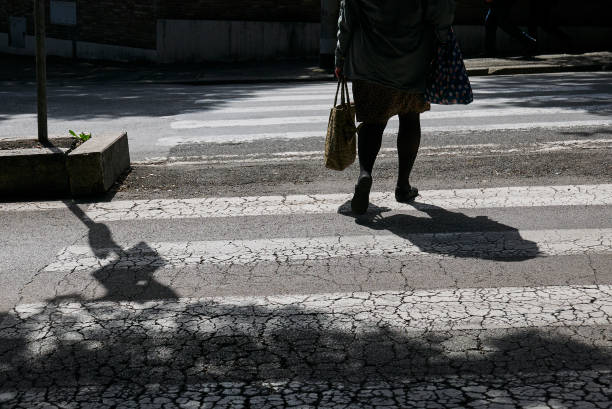 istock pedestrian crosses the pedestrian crossings 1472259866
