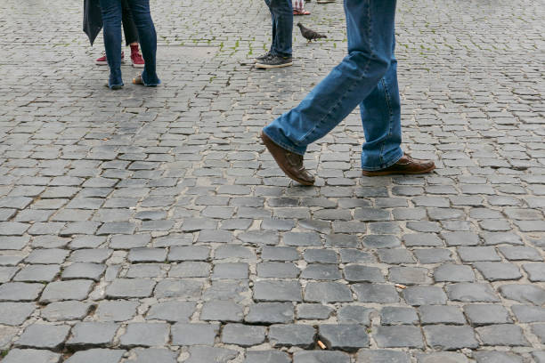 istock pedestrians on the road 1472261224