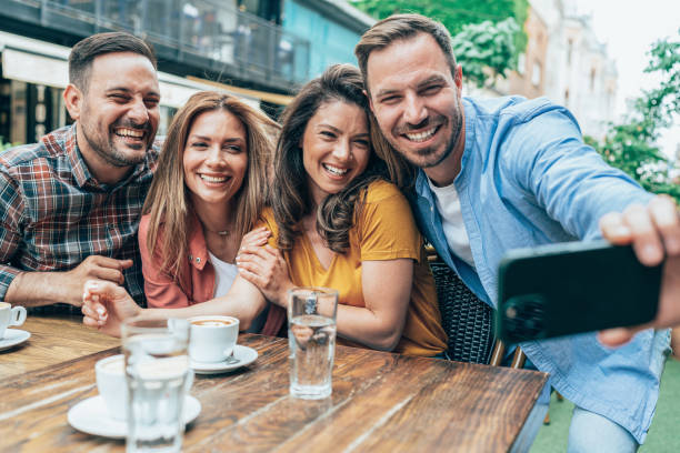istock Selfie with friends 1472269637