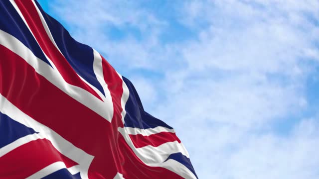 Seamless loop in slow motion of the United Kingdom national flag waving