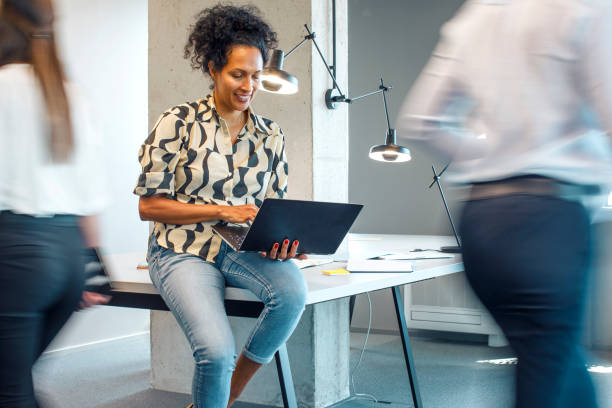 istock Businesswoman working on the laptop 1472271189