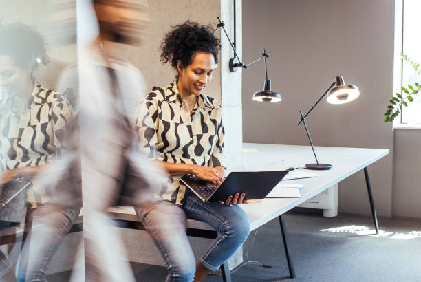 istock Businesswoman working on the laptop 1472271191