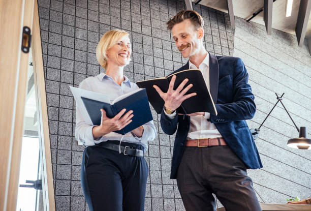 istock Two business people having a meeting 1472272378