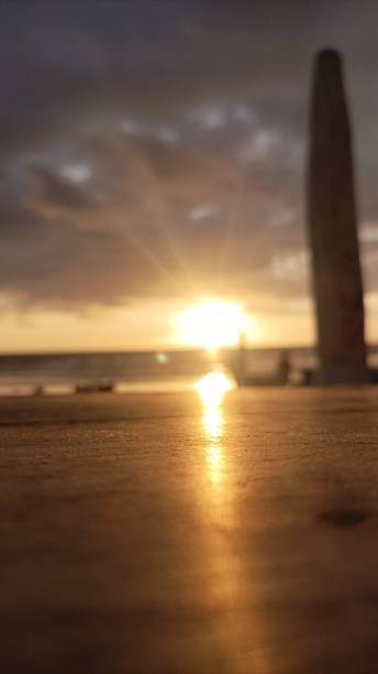 istock Beautiful Sunset and Wooden Table 1472272611