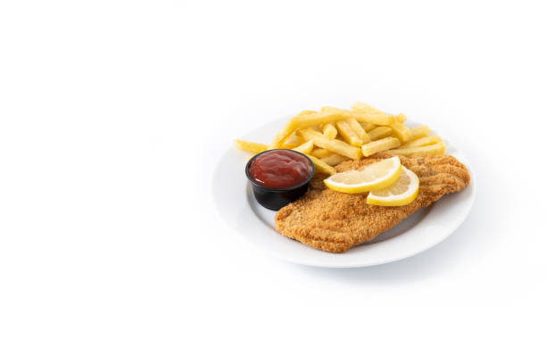 Wiener schnitzel with fried potatoes isolated on white background