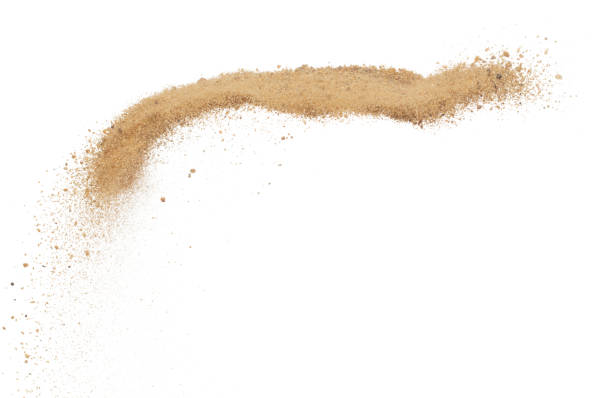 istock Big size Sand flying explosion, Golden grain sands wave explode. Abstract cloud fly. Yellow color sand splash throwing in Air. White background Isolated high speed shutter, throwing freeze stop motion 1472275078