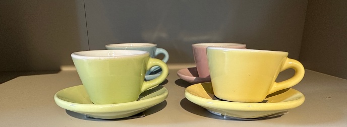 small glasses of green, yellow, blue and pink