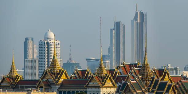 The Grand Palace and Modern Bangkok City Skyline, Thailand stock photo