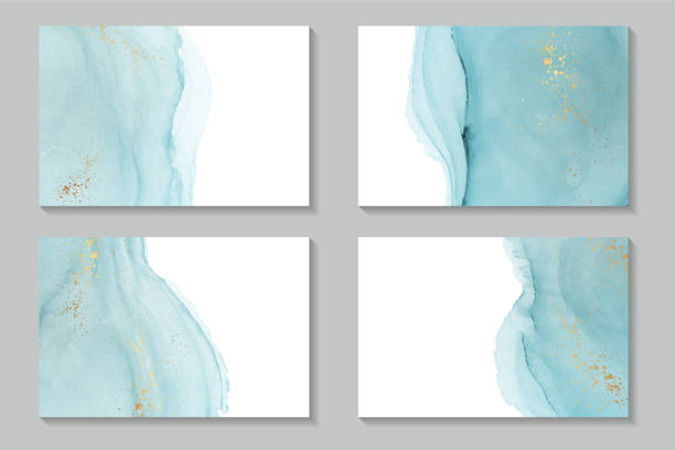 istock Watercolor backgrounds with abstract blue ink waves and golden splashes. 1472278122