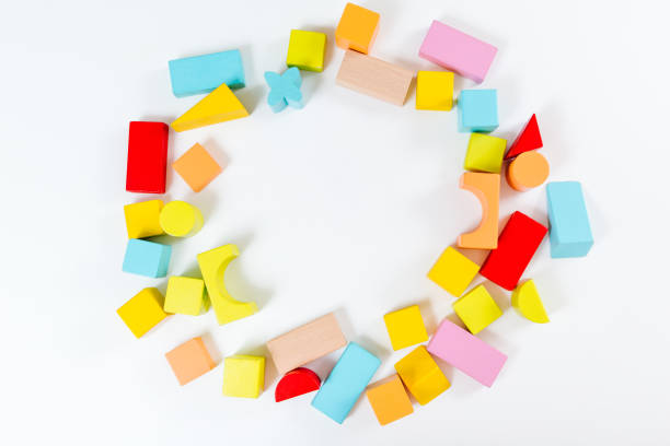 istock Colorful children's wooden construction set. White background. Flat lay. Natural materials. Learning and education concept. 1472278833