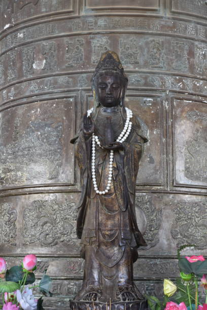 Standing Buddha in Karana Mudra in Linh Phuoc Bell Tower, Da Lat stock photo