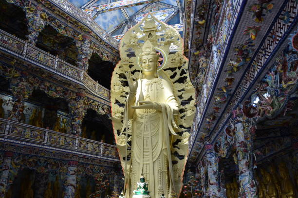 istock Giant Standing Buddha with Tiny Green Buddha, Linh Phuoc Pagoda, Da Lat 1472280594