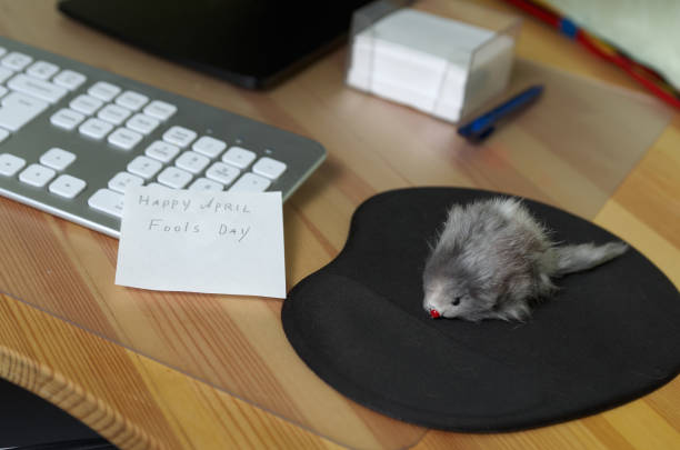The computer mouse has been replaced with a plush toy mouse. April Fool's joke