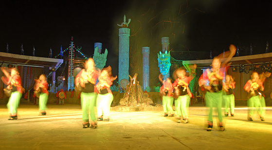 Fenghuang, Hunan Province, China: Dancers at a night festival in Fenghuang. These dancers are at a traditional cultural performance in China.