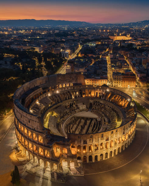 aerial view of the colosseum - rome coliseum night famous place imagens e fotografias de stock