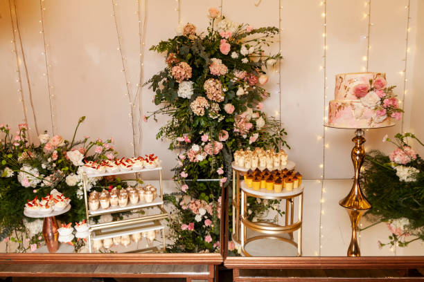 istock Reception Hall Decorated For Social Events; Dessert Table For Guests 1472286565