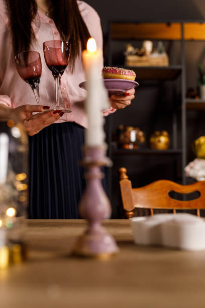 istock Young woman setting up the table for a celebratory event 1472286843