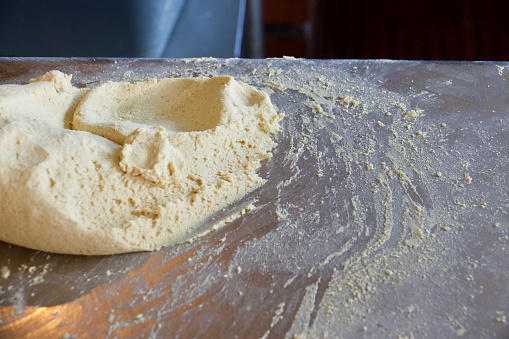 Making of a sourdough bread in a bakery