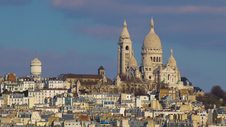 Wide view of the architecture of the streets of Paris, the architecture of the buildings of France Basilica in Montmartre
