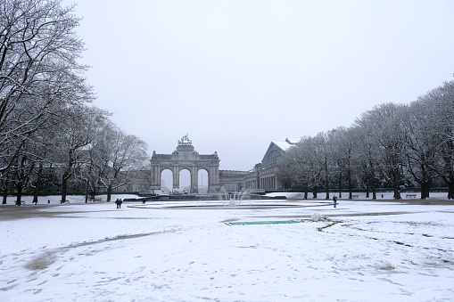 View of a public park during a snowfall in city of Brussels, Belgium on March 8, 2023