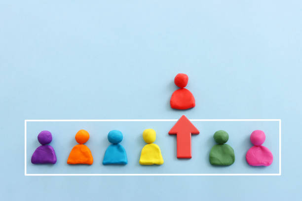 istock Red arrow and people figures. Leadership and growth concept 1472297736