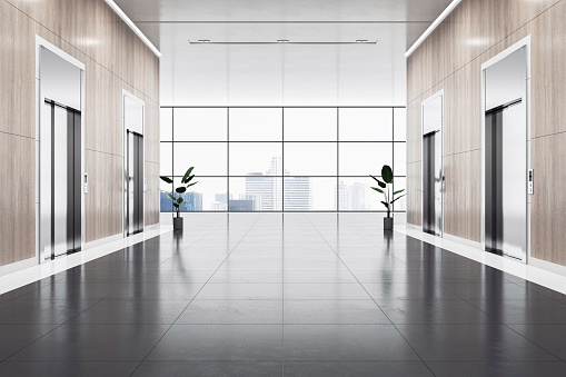 Empty spacious business center corridor with wooden walls and place for product presentation on dark floor between elevators on city view background from panoramic window. 3D rendering, mockup