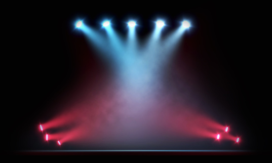 Bright white spotlights illuminating an empty stage with red lights on the sides, with a smoke and dust effect, isolated on a black background. Special effect for image editing, photo retouch, overlay and screen blend modes. No people with copy space.