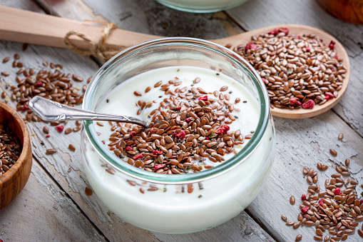 Mixture of seeds, raspberries and yoghurt - linseed, hemp, chia, psyllium