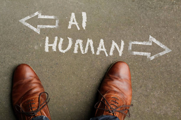 istock Looking down at the words AI and Human 1472303151