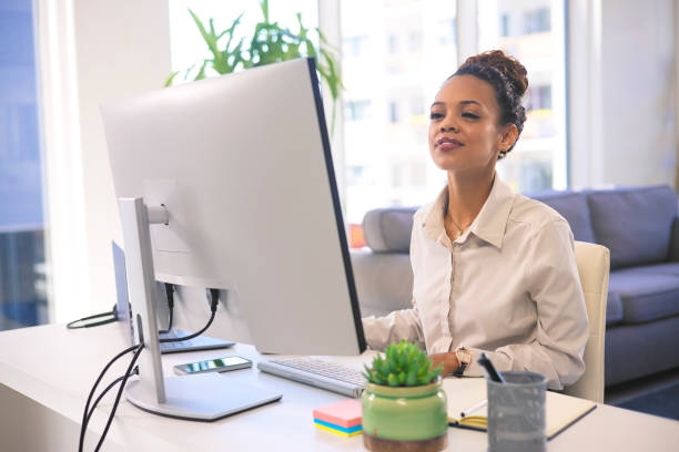 istock Computer, office analysis or black woman reading article for social media database, digital website or online blog. Brand monitoring administration, research or worker review customer experience data 1472305291