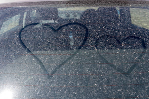 istock Heart drawings on dusty car window 1472308264